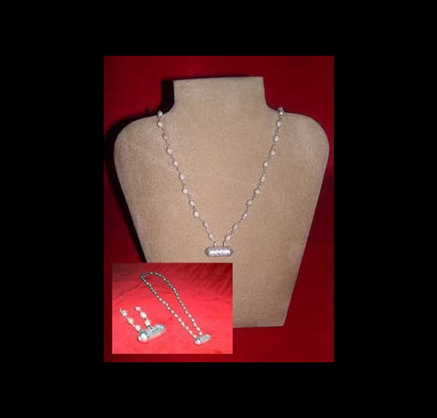 Tulasi necklace with silver finishes Tulasi necklace with silver finishes