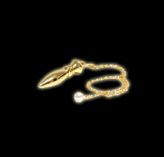 EGYPTIAN BRASS PENDULUM EGYPTIAN BRASS PENDULUM